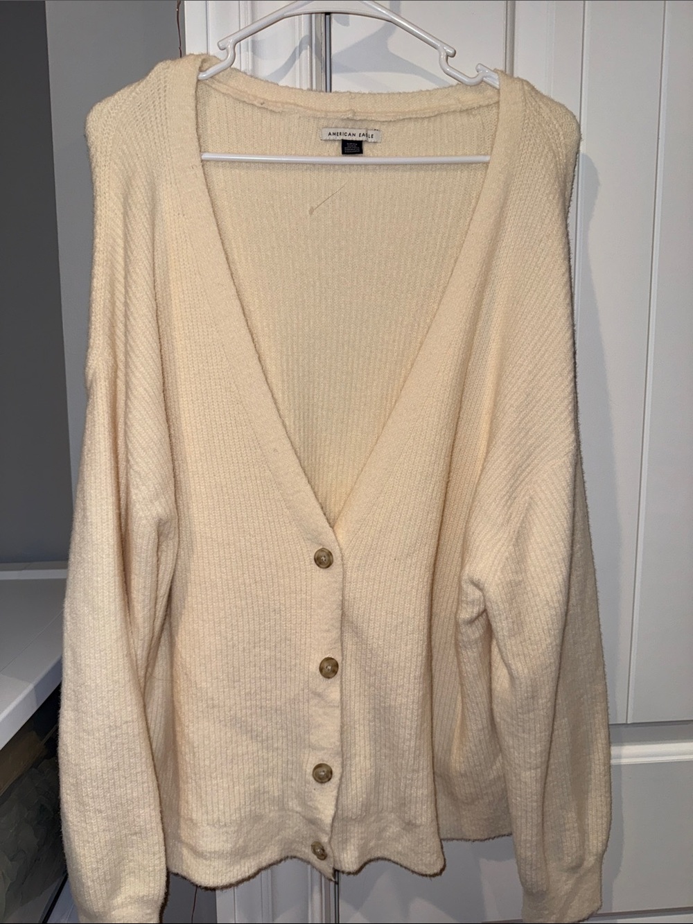 American Eagle Outfitters Cream Button-Up V-Neck Cardigan